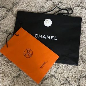 2 paper bags-  CHANEL (large) and Hermes